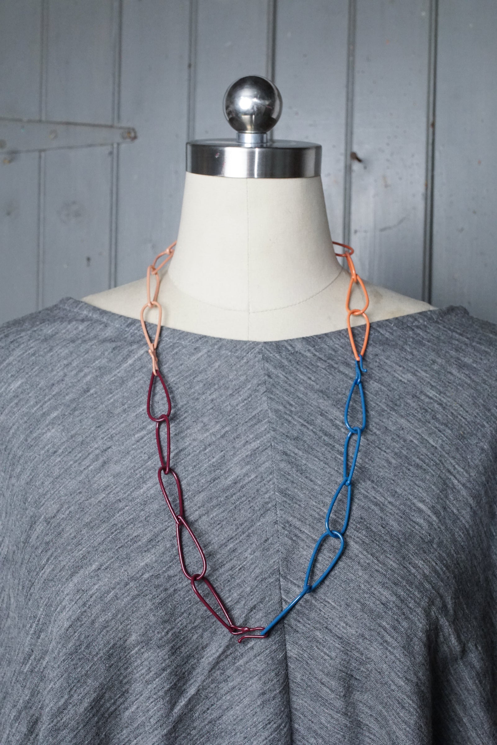 long Modular Necklace in burgundy, blue, and coral
