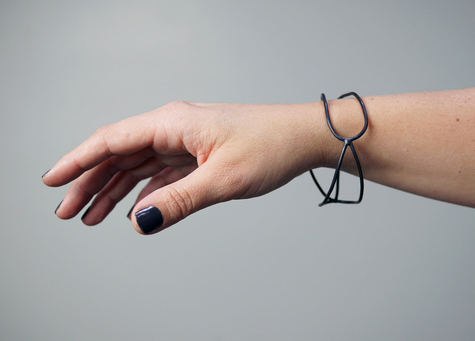 wide monument bracelet in steel