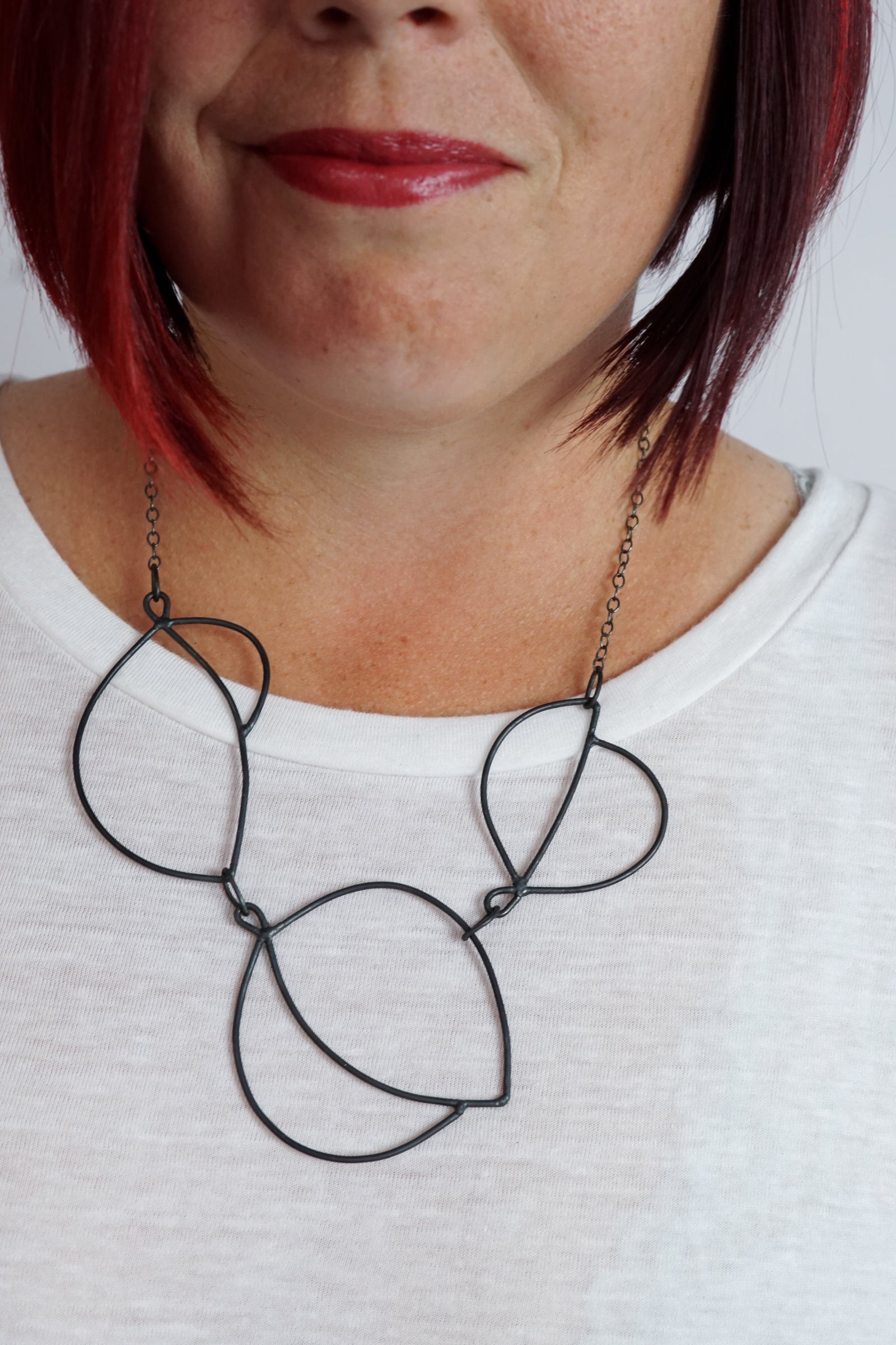 Embiller Necklace in steel, silver, or bronze