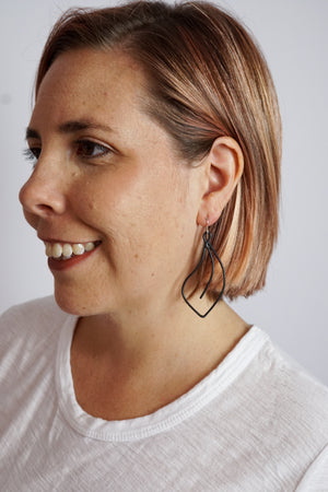Flourish Earrings in black steel, silver, or bronze