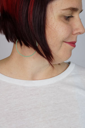 Large Evident Earrings in Pale Green