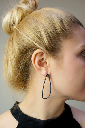 large petal post earrings in black