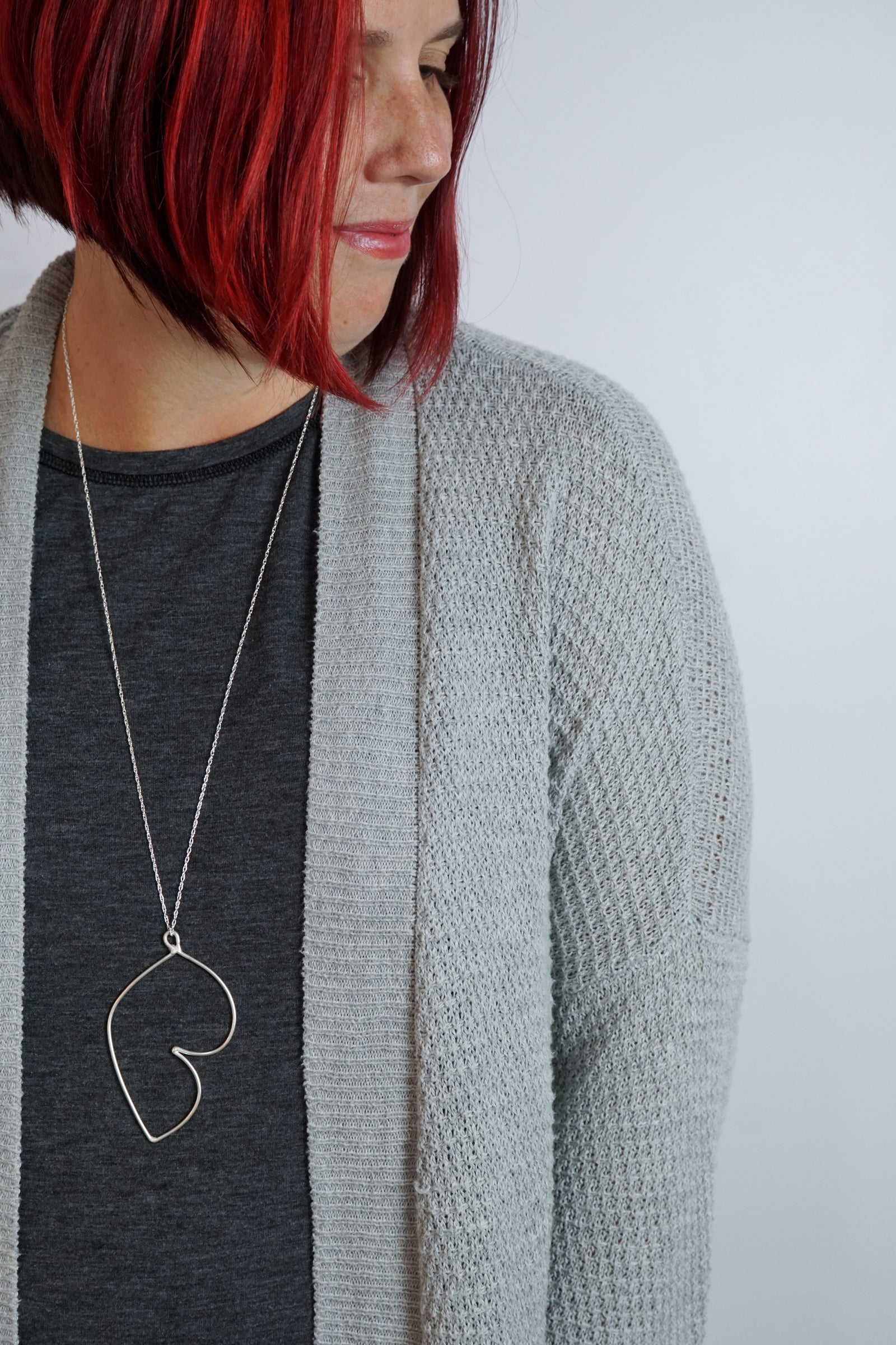 long handmade silver pendant inspired by Matisse